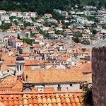 Taura - With Balcony And Old View